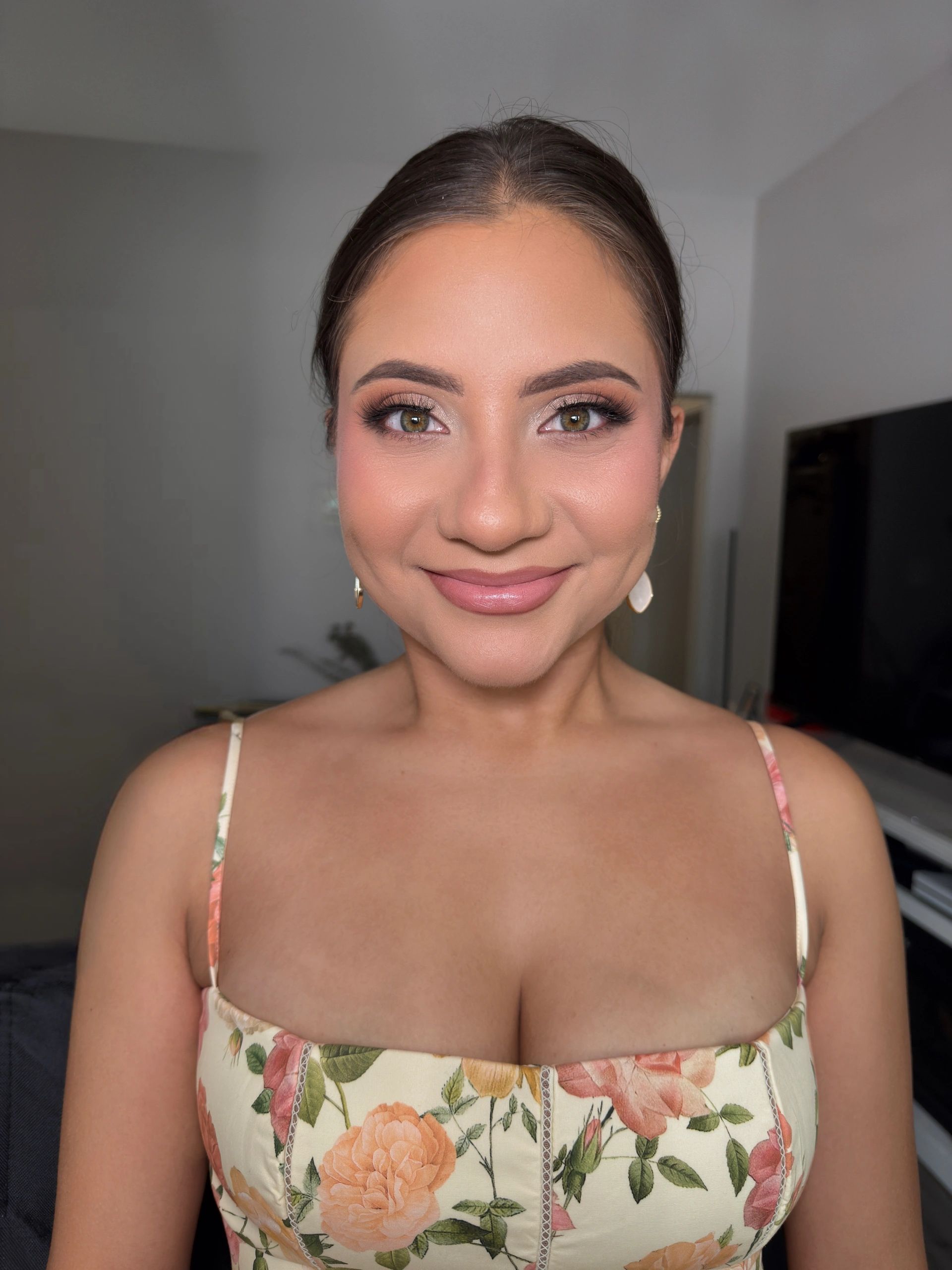 Portrait with pink lipstick and pearl earrings